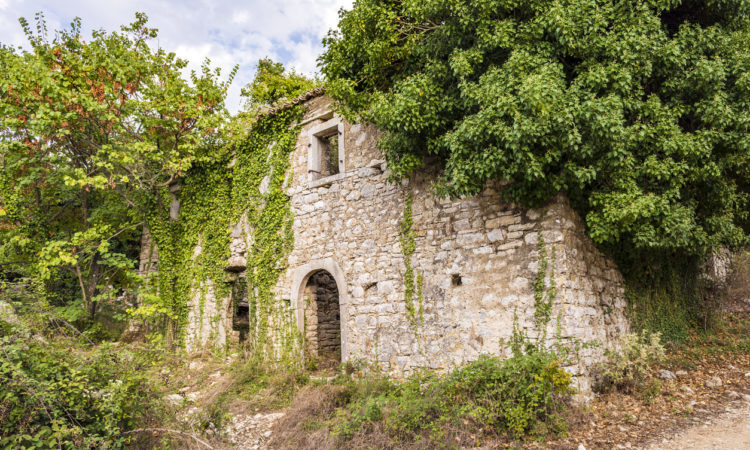 Old abandoned stone-built house in Old Perithia