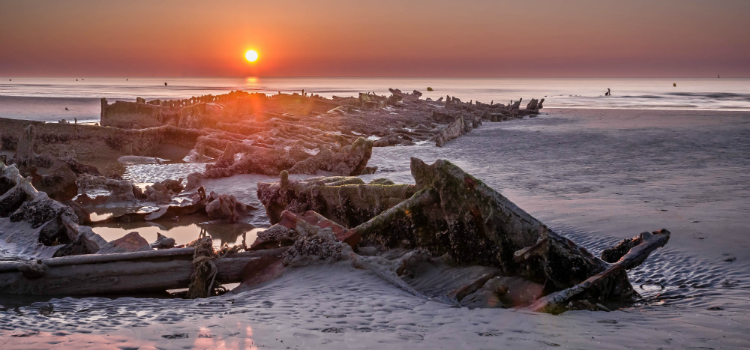 Remains of HMS Crested Eagle on Dunkirk beach, destroyed during WWII
